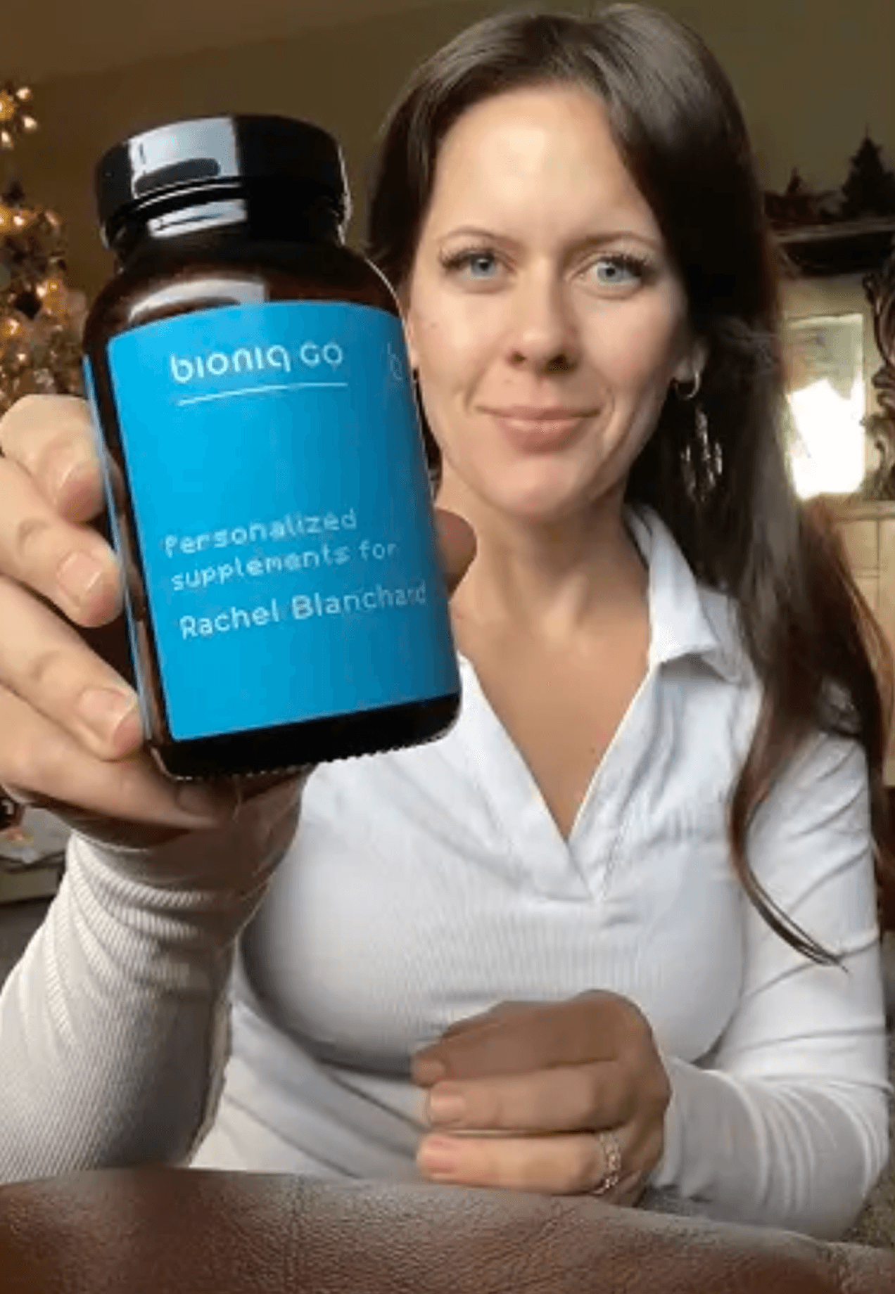Portrait of woman holding Bioniq bottle